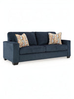 Canapé TOCO Meubles Toscana bleu marine en tissu texturé avec deux coussins décoratifs à motifs géométriques