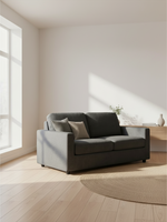 Causeuse deux places grise TOCO Meubles avec coussins décoratifs dans un salon lumineux au style minimaliste