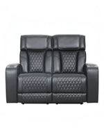 Causeuse inclinable noire Warren de TOCO Meubles avec détails matelassés en losange et porte-gobelets intégrés.