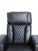 Causeuse inclinable Warren de TOCO Meubles en cuir noir avec dossier matelassé en losanges pour un confort optimal.