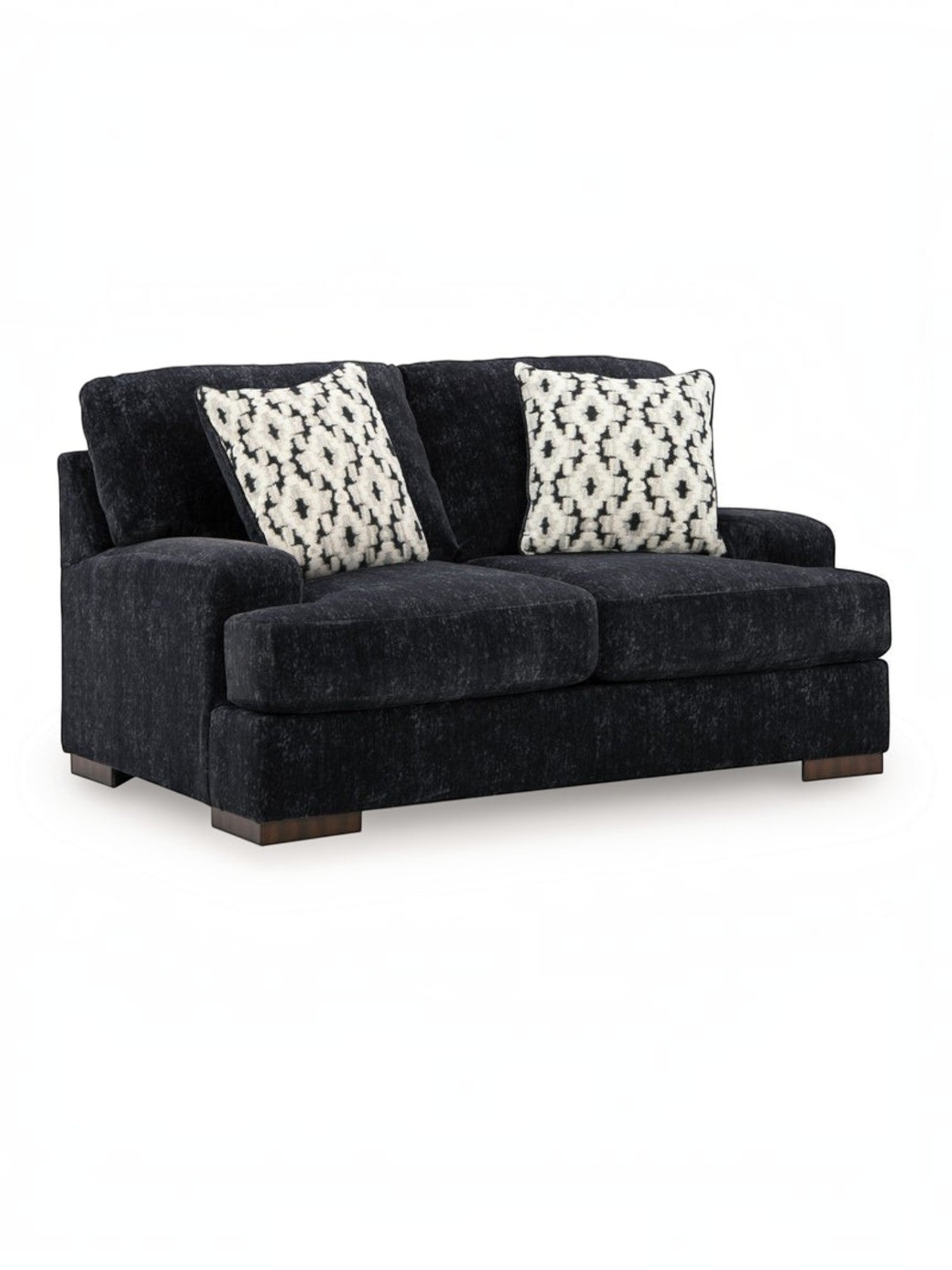 Causeuse Mistral TOCO Meubles en tissu noir texturé avec deux coussins décoratifs à motifs géométriques