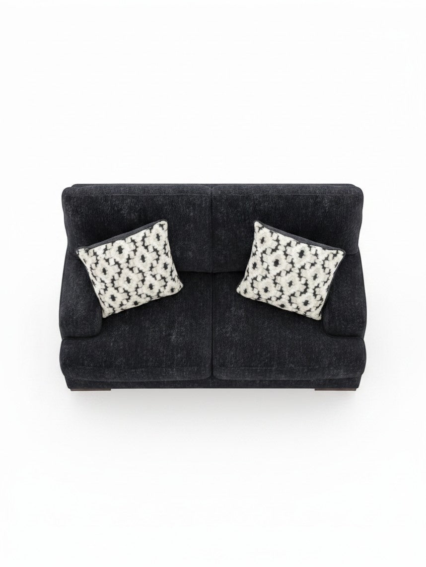 Causeuse Mistral TOCO Meubles noire avec deux coussins décoratifs à motifs géométriques vue de dessus