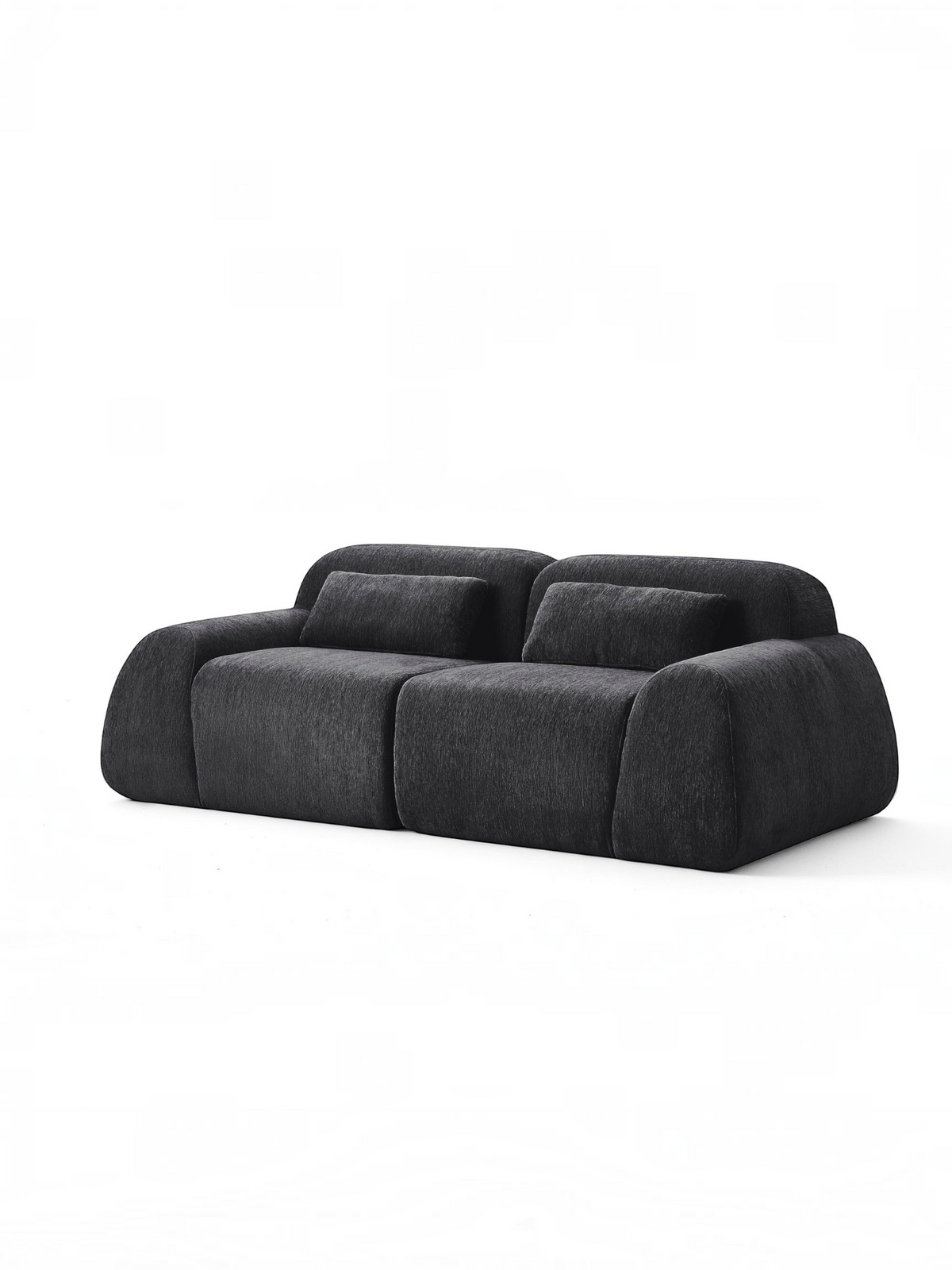 Causeuse modulaire noire Mia de TOCO Meubles au design contemporain avec deux coussins décoratifs sur fond blanc
