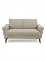 Causeuse Tano beige en tissu de TOCO Meubles, avec pieds en bois et design moderne.