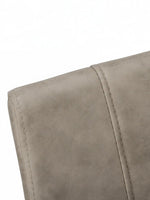 TOCO Meubles Chaise Baxter taupe effet suède, assise confortable, base métal noir, design moderne sans accoudoirs.