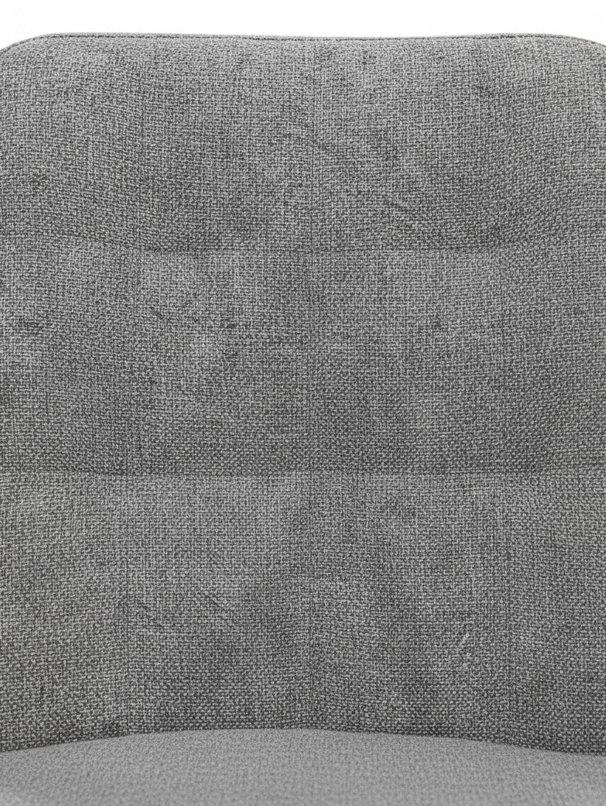 Gros plan sur le tissu bouclé gris texturé et capitonné de la chaise de salle à manger Beaulieu par TOCO Meubles
