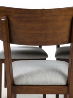 Chaise de salle à manger TOCO Meubles en bois brun avec assise rembourrée en tissu gris, vue de dos
