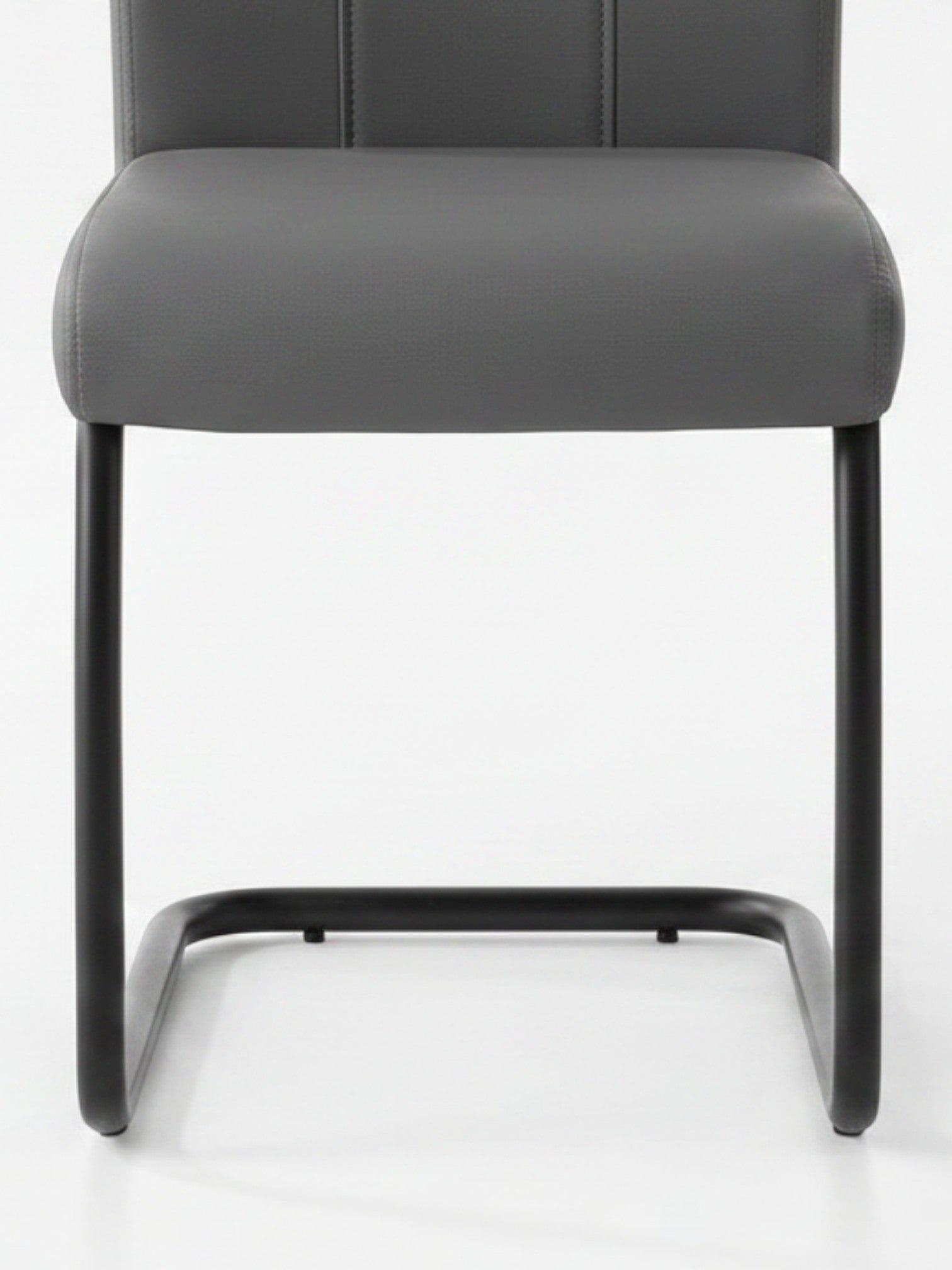 Chaise de cuisine Xena TOCO Meubles avec assise grise en similicuir et structure en métal noir