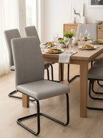 Ensemble de deux chaises de cuisine TOCO Meubles Zeno en simili suède gris avec base en métal noir en forme de U
