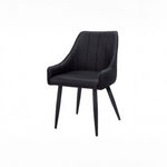 Chaise de salle à manger Hendrix TOCO Meubles en similicuir noir capitonné avec pieds noirs effilés
