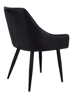 TOCO Meubles Chaise Hendrix noire en similicuir capitonné, pieds métal noir effilés, design moderne.