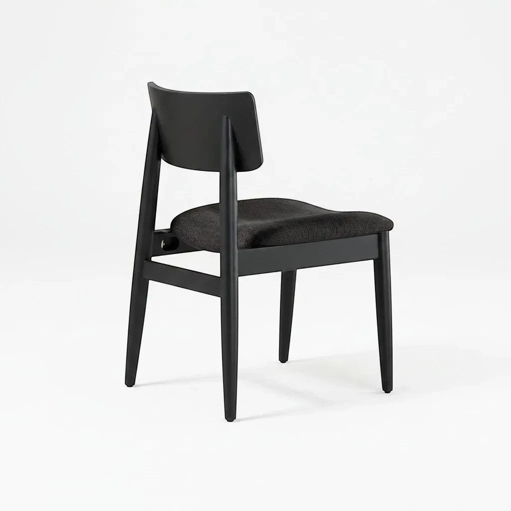 Chaise Transformer TOCO Meubles en hickory fumé, assise rembourrée noire, design moderne et ergonomique.