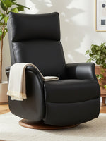 Chaise inclinable Eva TOCO Meubles en cuir noir avec base pivotante en bois dans un salon moderne et lumineux
