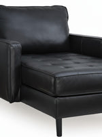 Chaise longue Bryce de TOCO Meubles en cuir noir avec assise capitonnée et pieds élégants