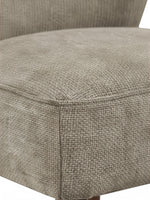 Gros plan sur le revêtement en tissu texturé gris taupe de la chaise d'appoint Lucien par TOCO Meubles