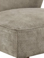 Gros plan sur le revêtement en tissu texturé gris taupe de la chaise d'appoint Lucien par TOCO Meubles