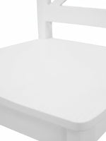 Gros plan sur le siège blanc de la chaise Maldive de TOCO Meubles au design classique et épuré