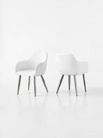 TOCO Meubles Chaise salle à manger Parker blanche en similicuir avec pieds chromés, design moderne et confortable.