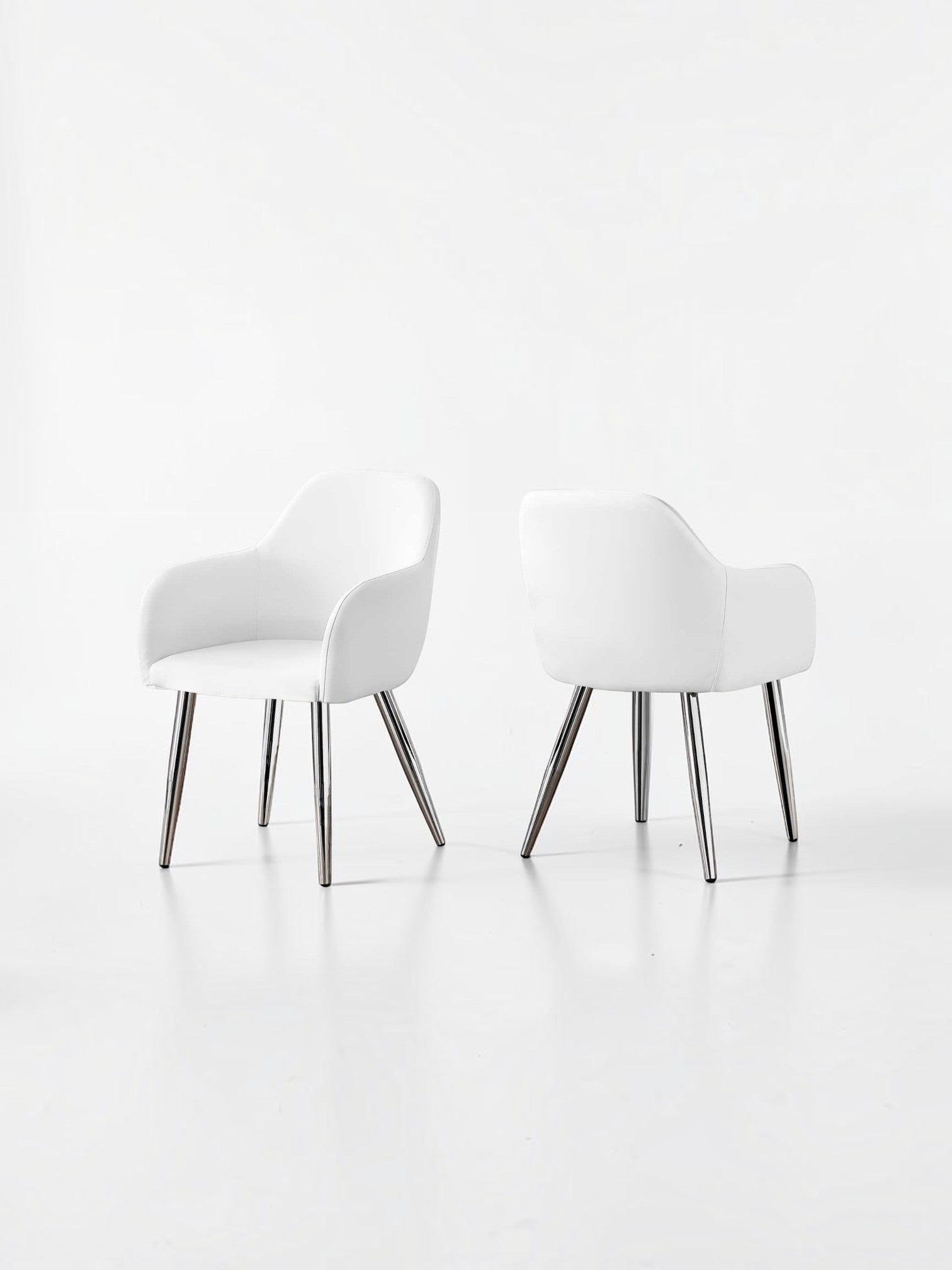 TOCO Meubles Chaise salle à manger Parker blanche en similicuir avec pieds chromés, design moderne et confortable.
