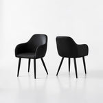 Chaise de salle à manger Parker en similicuir noir de TOCO Meubles, avec accoudoirs et pieds noirs, style contemporain.