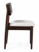 Chaise ronde TOCO Meubles en bois foncé avec coussin d'assise blanc, design moderne et épuré.