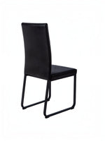 Chaise de salle à manger Norka TOCO Meubles noire avec structure en bois et finition mate vue de trois-quarts arrière