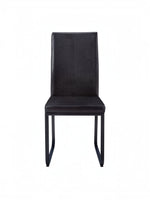Chaise de salle à manger Norka par TOCO Meubles, design épuré avec structure en bois noir et finition mate.