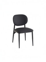 Chaise de salle à manger Gidéo TOCO Meubles noire en similicuir avec dossier ovale et structure en métal noir mat