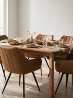 Chaise de salle à manger Talo TOCO Meubles en similicuir cognac avec dossier capitonné et pieds en métal noir