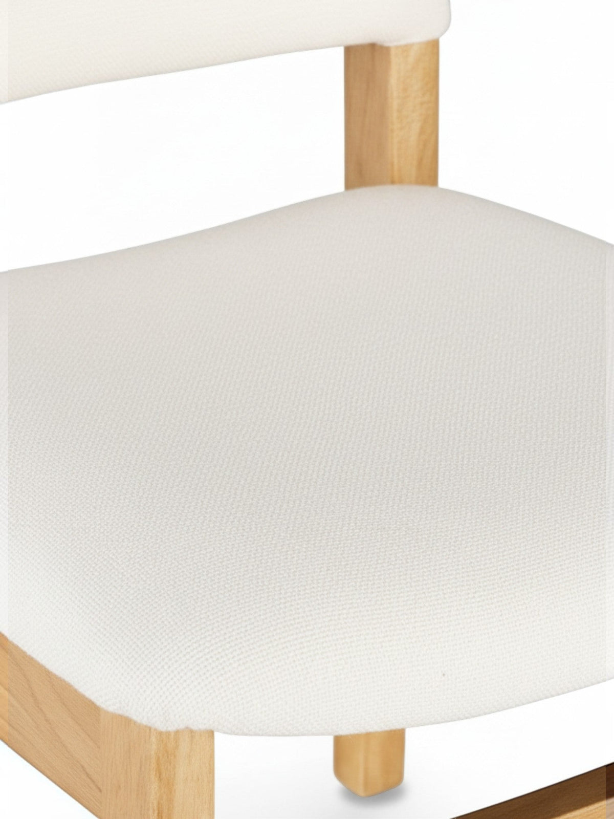 Gros plan sur le siège en tissu blanc et la structure en chêne scandinave de la chaise TOCO Meubles Transformer