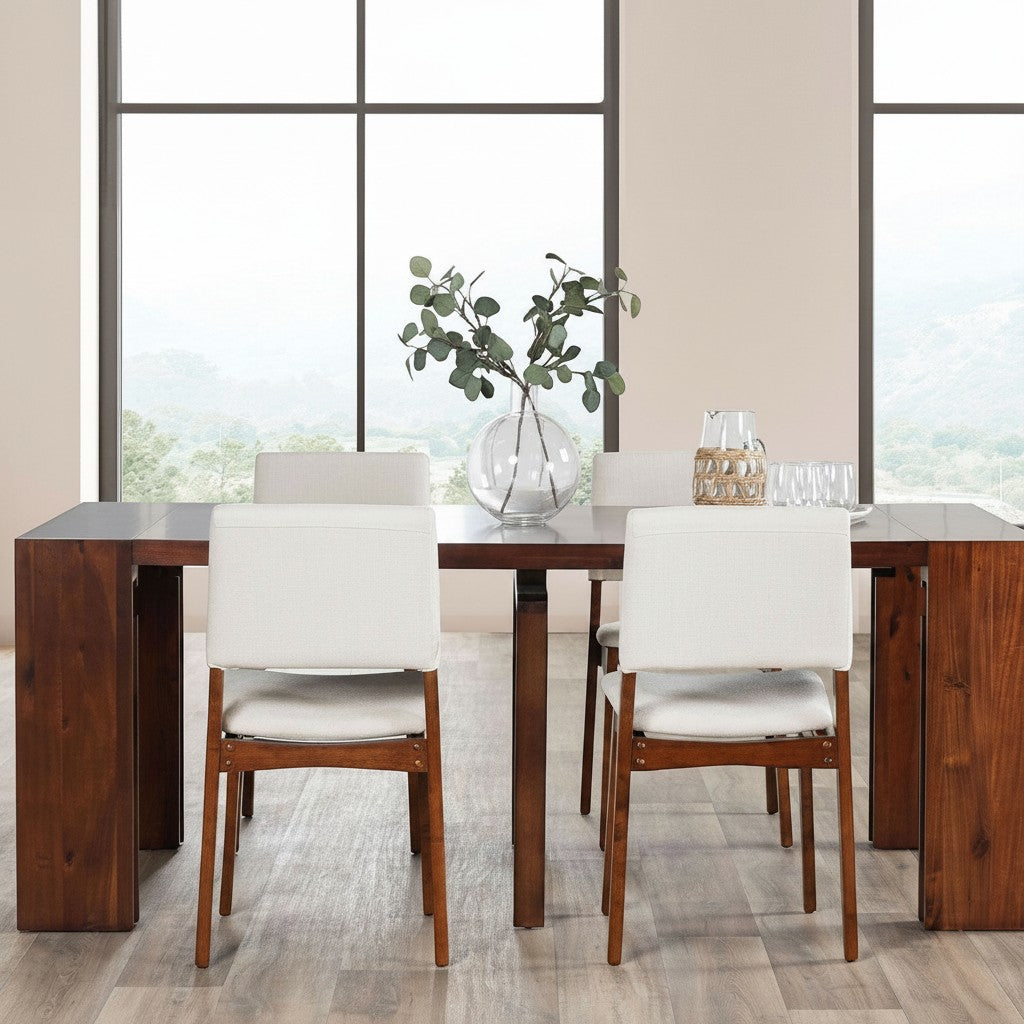 Chaises Transformer Table TOCO Meubles en noyer américain, assise et dossier blancs, design moderne et épuré.