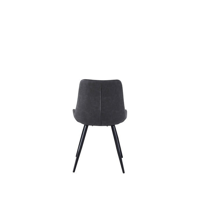 Chaise de salle à manger Vito TOCO Meubles en similicuir gris marbré avec pieds en métal noir.