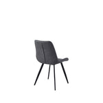 Chaise de salle à manger Vito TOCO Meubles en similicuir gris marbré avec pieds en métal noir.
