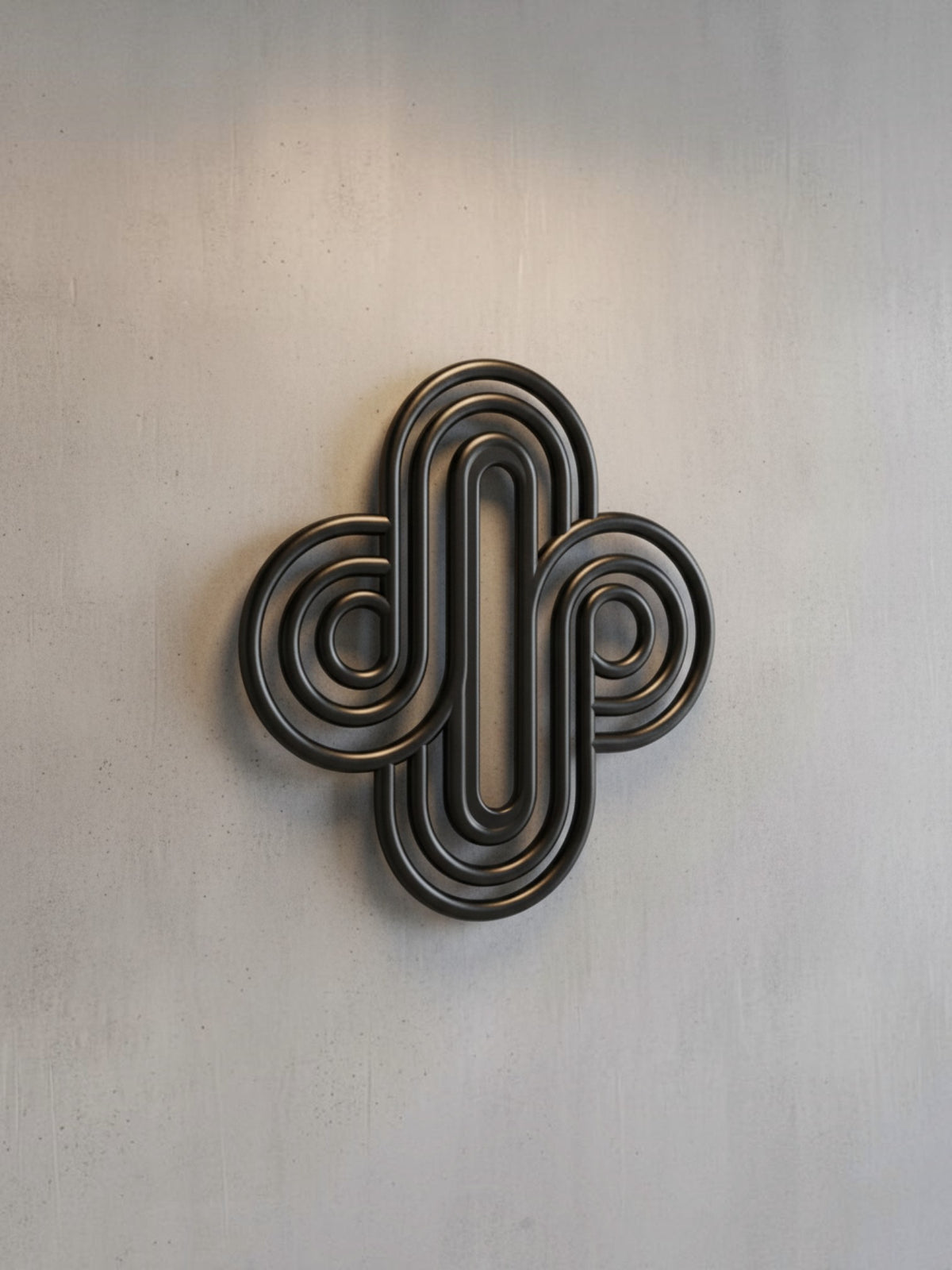 Décoration murale TOCO Meubles Aurum en métal noir avec un design géométrique abstrait et des courbes entrelacées.