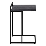 TOCO Meubles Eliott C-shaped side table with black wood-effect top and black metal frame.