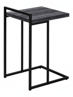 TOCO Meubles Eliott C-shaped side table with black wood-effect top and black metal frame