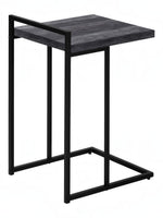 TOCO Meubles Eliott C-shaped side table with black wood-effect top and black metal frame