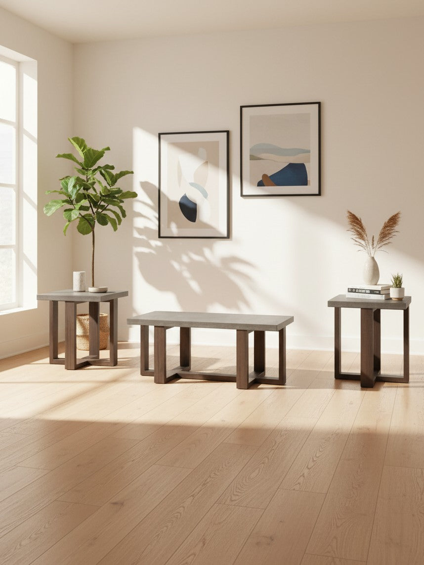 Ensemble de trois tables basses TOCO Meubles avec plateaux gris et pieds en bois brun dans un salon lumineux