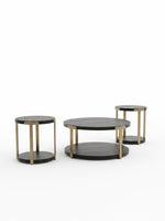 Ensemble de trois tables basses TOCO Meubles Shylo avec plateaux noirs ronds et pieds en métal finition laiton