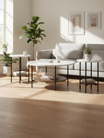 Ensemble de trois tables basses TOCO Meubles avec plateaux blancs ronds, pieds noirs et étagères inférieures en bois.