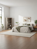 Étagère Moka de TOCO Meubles en bois vieilli dans une chambre lumineuse au style naturel et minimaliste