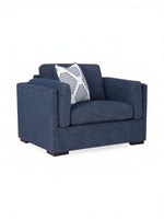 Fauteuil une place et demie TOCO Meubles Evan en tissu bleu texturé avec coussin décoratif à motifs géométriques