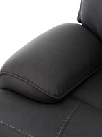 Fauteuil inclinable Elvis noir en similicuir de TOCO Meubles, avec surpiqûres contrastantes et accoudoir rembourré.