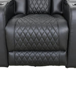 Fauteuil inclinable Warren noir TOCO Meubles en cuir avec surpiqûres en losange et porte-gobelets intégrés.