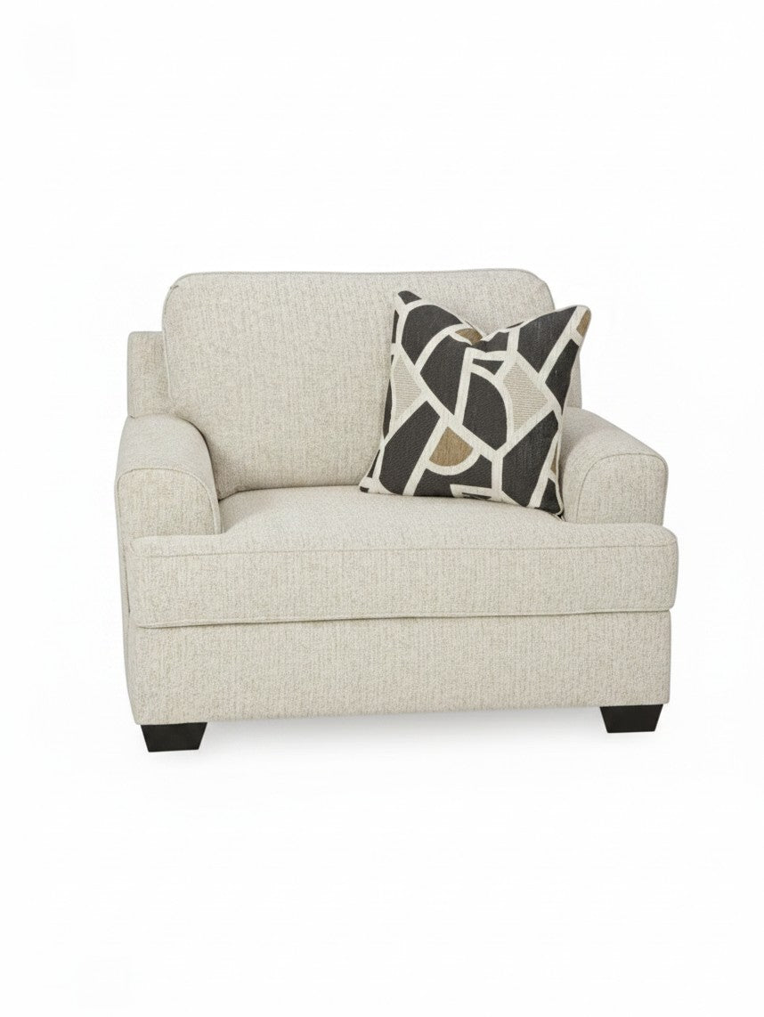 Fauteuil TOCO Meubles Moka couleur quartz avec coussin décoratif à motifs géométriques sur fond blanc