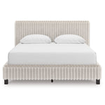 Grand lit Chloe TOCO Meubles en tissu texturé côtelé gris clair, design contemporain et chic.