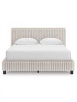 Grand lit Chloe TOCO Meubles en tissu texturé côtelé gris clair, design contemporain et chic.