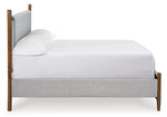 Grand Lit Flora TOCO Meubles en tissu gris clair avec tête de lit rembourrée et pieds en bois