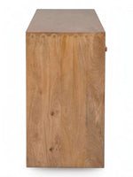 TOCO Meubles Kelani console table in natural wood finish with decorative carved edge detail.