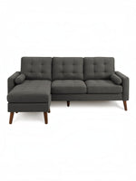 TOCO Meubles Sofa sectionnel Khamo gris foncé capitonné avec repose-pieds et coussins cylindriques